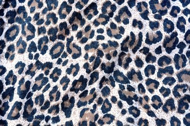 arka planda motifleri leopar kumaş 