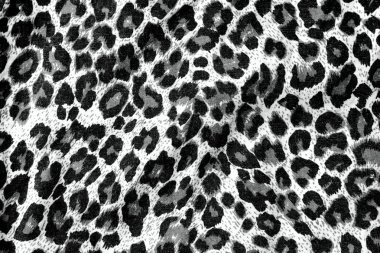 arka planda motifleri leopar kumaş 