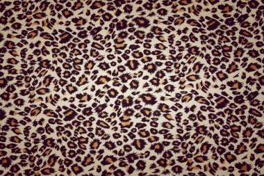 arka planda motifleri leopar kumaş 