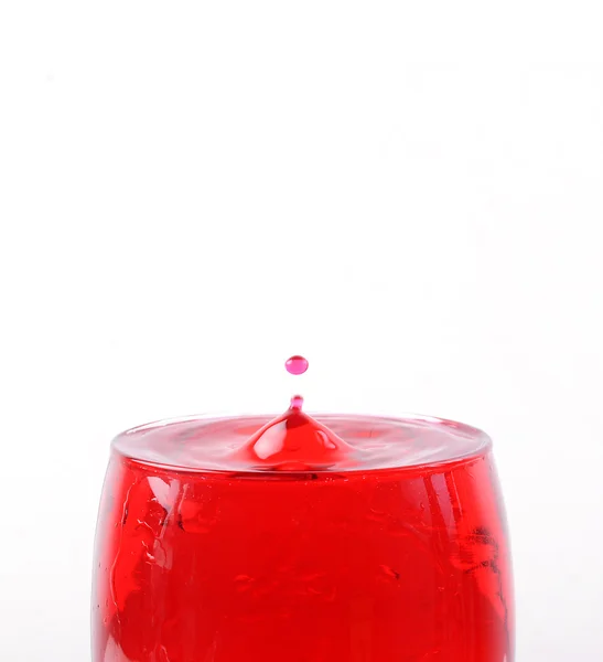 Pouring red wine in glass — Stock Photo, Image