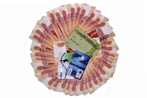 Plastic cards and pension certificate on the background of notes — Stock Photo, Image