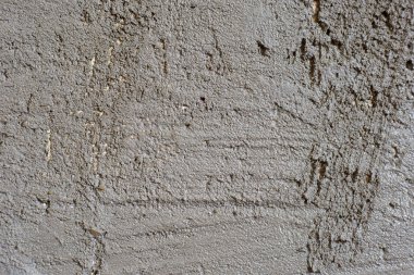 Gri renkli duvardaki dekoratif alçı iyi bir arkaplan veya dokudur.