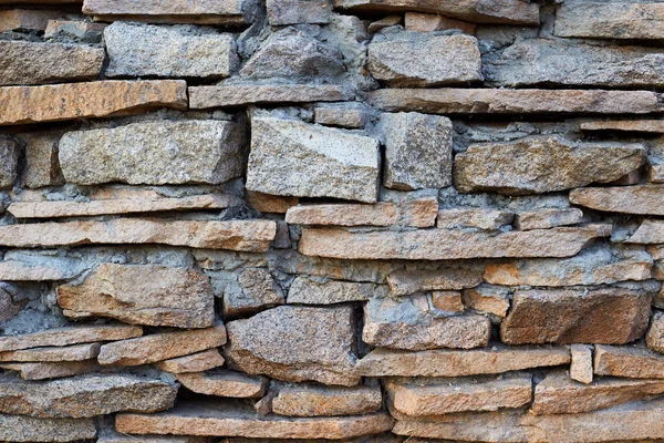 天然石造りの壁やフェンスの概念の背景テクスチャ — ストック写真