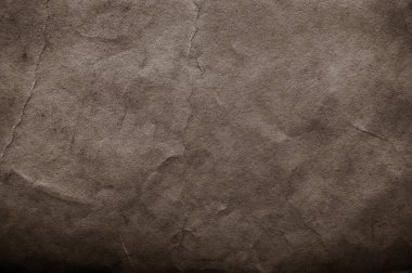 Koyu renk sanat arkaplan. Eski, kıvrımlı, buruşuk kağıt.