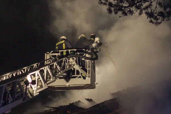 Firefighters at work — Stock Photo, Image