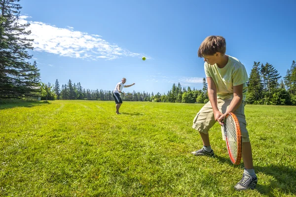 Boys playing a tennis — Stock Photo, Image