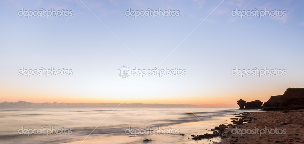 Ocean beach at the sunrise