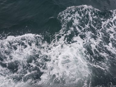 Surface of blue water Sea wave Colored background