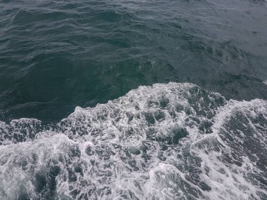 Surface of blue water Sea wave Colored background