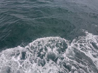 Surface of blue water Sea wave Colored background