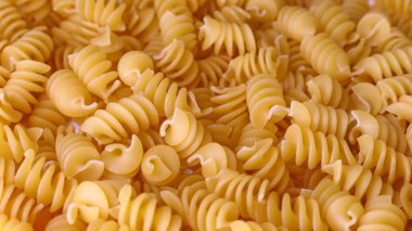 Dry Italian pasta background healthy food photo Top view Close-up