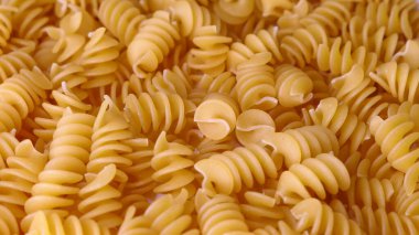 Dry Italian pasta background healthy food photo Top view Close-up
