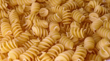Dry Italian pasta background healthy food photo Top view Close-up