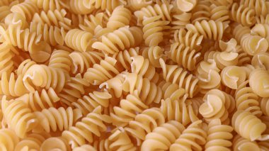 Dry Italian pasta background healthy food photo Top view Close-up