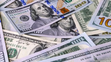 Background of US Currency banknotes Financial concept Money background Hundred dollar bills Top view Close up
