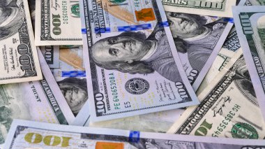 Background of US Currency banknotes Financial concept Money background Hundred dollar bills Top view Close up