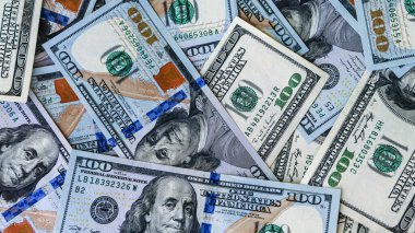 Background of US Currency banknotes Financial concept Money background Hundred dollar bills Top view Close up