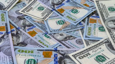 Background of US Currency banknotes Financial concept Money background Hundred dollar bills Top view Close up