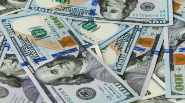 Background of US Currency banknotes Financial concept Money background Hundred dollar bills Top view Close up