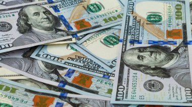 Background of US Currency banknotes Financial concept Money background Hundred dollar bills Top view Close up