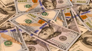 Background of US Currency banknotes Financial concept Money background Hundred dollar bills Top view Close up