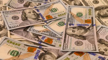 Background of US Currency banknotes Financial concept Money background Hundred dollar bills Top view Close up