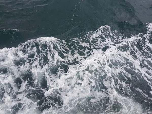 Surface of blue water Sea wave Colored background