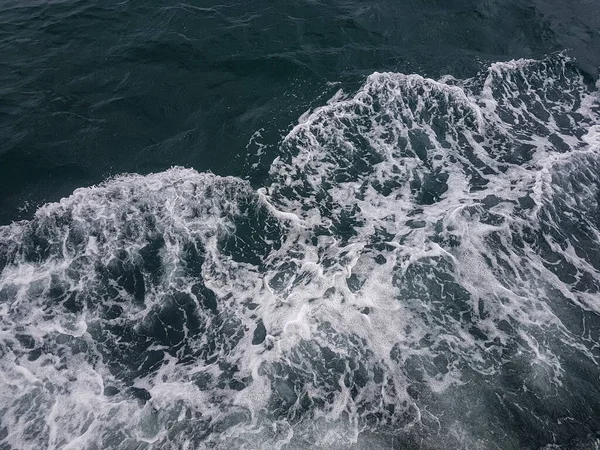 Surface of blue water Sea wave Colored background