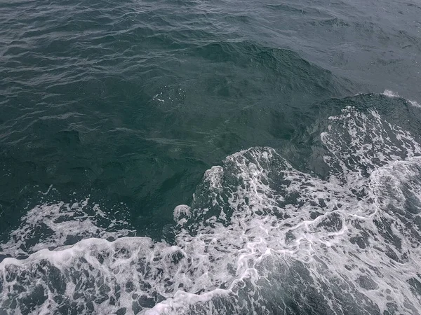 Surface of blue water Sea wave Colored background