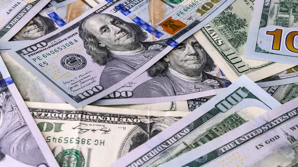 Background of US Currency banknotes Financial concept Money background Hundred dollar bills Top view Close up