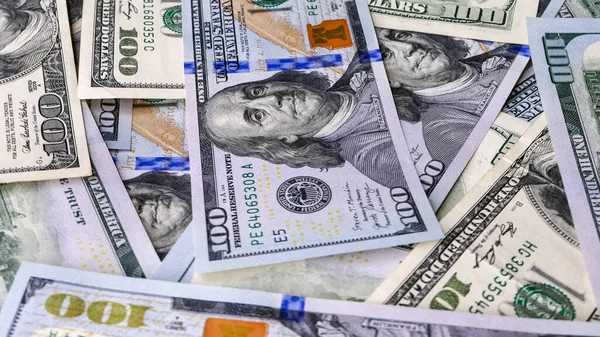 Background of US Currency banknotes Financial concept Money background Hundred dollar bills Top view Close up