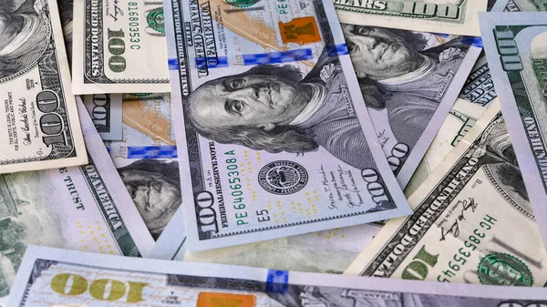Background of US Currency banknotes Financial concept Money background Hundred dollar bills Top view Close up
