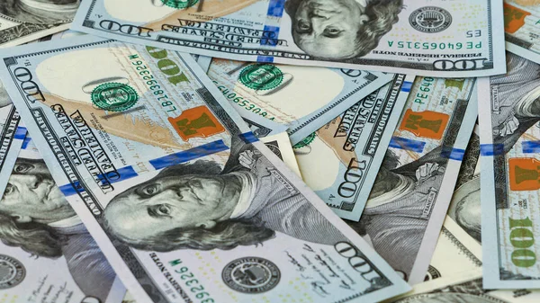 Background of US Currency banknotes Financial concept Money background Hundred dollar bills Top view Close up