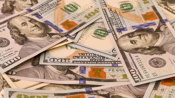 Background of US Currency banknotes Financial concept Money background Hundred dollar bills Top view Close up