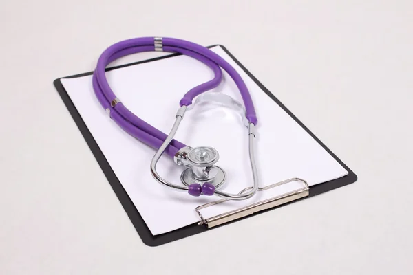 Stethoscope and a form for recording — Stock Photo, Image