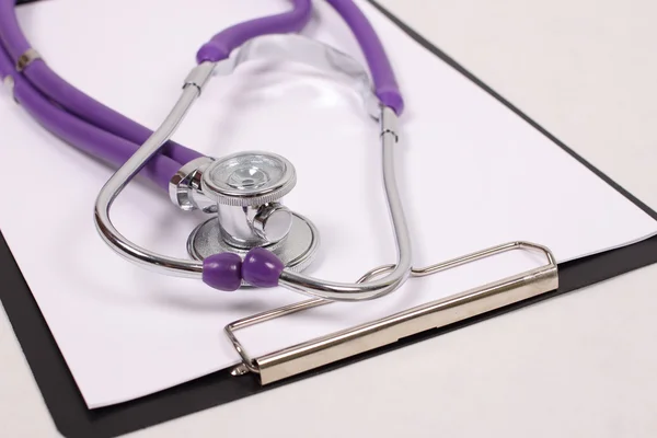 Stethoscope and a form for recording — Stock Photo, Image