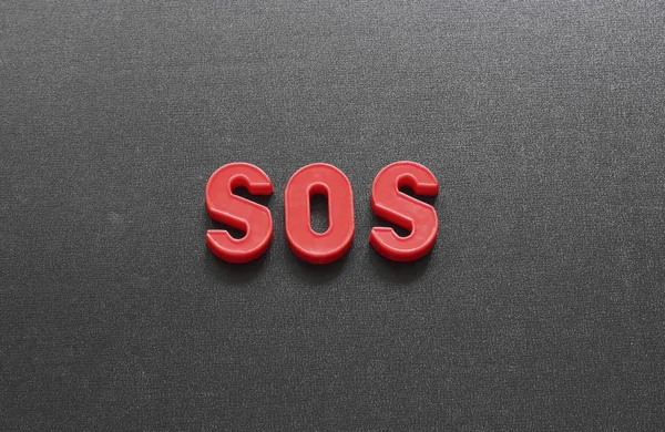 题字 sos — 图库照片