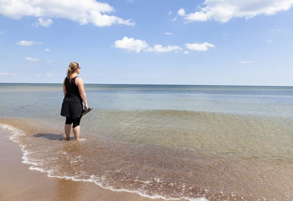 Op het strand — Stockfoto