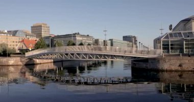 Malmoe, Sweden - 02 SEPTEMBER, 2021: The new part of Malmoe City is taking shape. Bagers Plats, Malmoe, seen from Norra Vallgatan. View over Bagers Bridge, Borshuset and the inner harbor with Universitetsholmen.
