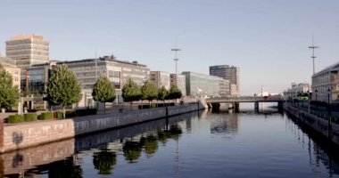 Malmoe, Sweden - 02 SEPTEMBER, 2021: The new part of Malmoe City is taking shape. Bagers Plats, Malmoe, seen from Norra Vallgatan. View over Bagers Bridge, Borshuset and the inner harbor with Universitetsholmen.