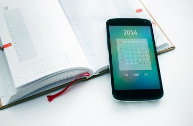 Modern cep telefonu ile Nisan 2014 için takvim.