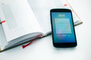 Modern cep telefonu ile Mart 2014 için takvim.