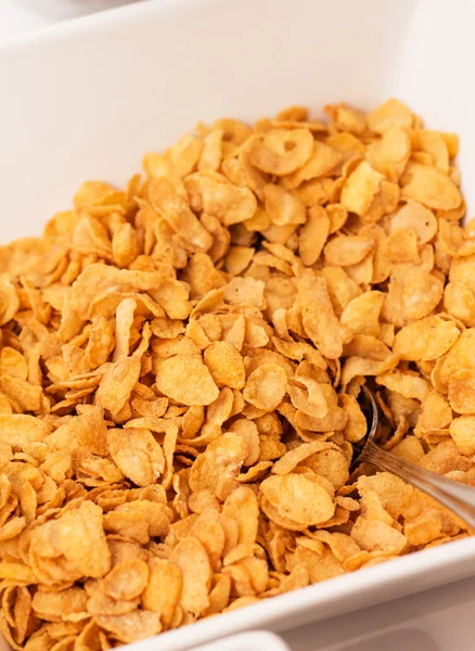 Schüssel Cornflakes mit Löffel — Stockfoto