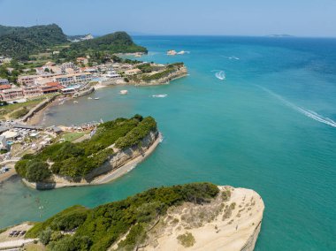 Aerial view of the promontory of Sidari in the northern part of the island of Corfu, Greece. Canal D'Amour cliffs. Bathers on the rocks and in the water