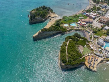 Aerial view of the promontory of Sidari in the northern part of the island of Corfu, Greece. Canal D'Amour cliffs. Bathers on the rocks and in the water