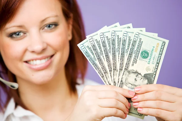 CSR: Holding Up a Money Fan — Stock Photo, Image