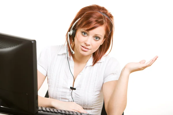 CSR: Woman at Desk with Headset — Stock Photo, Image