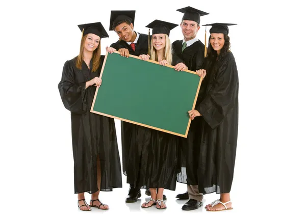 毕业: 毕业生持空白的黑板的消息 — 图库照片