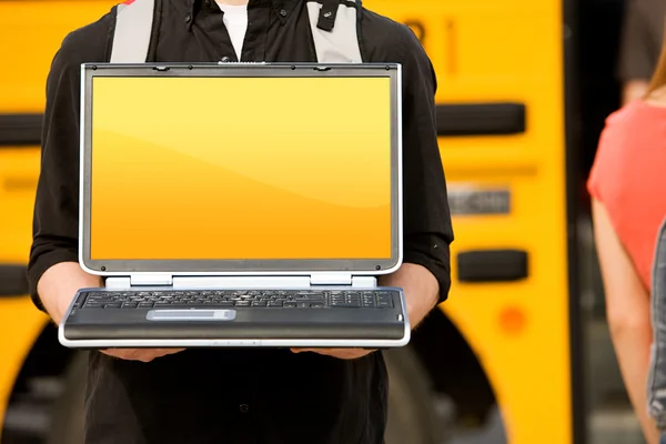 School Bus: Holding Laptop with Blank Screen — Stock Photo, Image