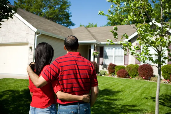 Home: Owners Admiring their Home — Stock Photo, Image